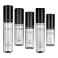 Five NIKQ skincare fluid bottles with black caps and white labels, arranged in a row against a plain white background.