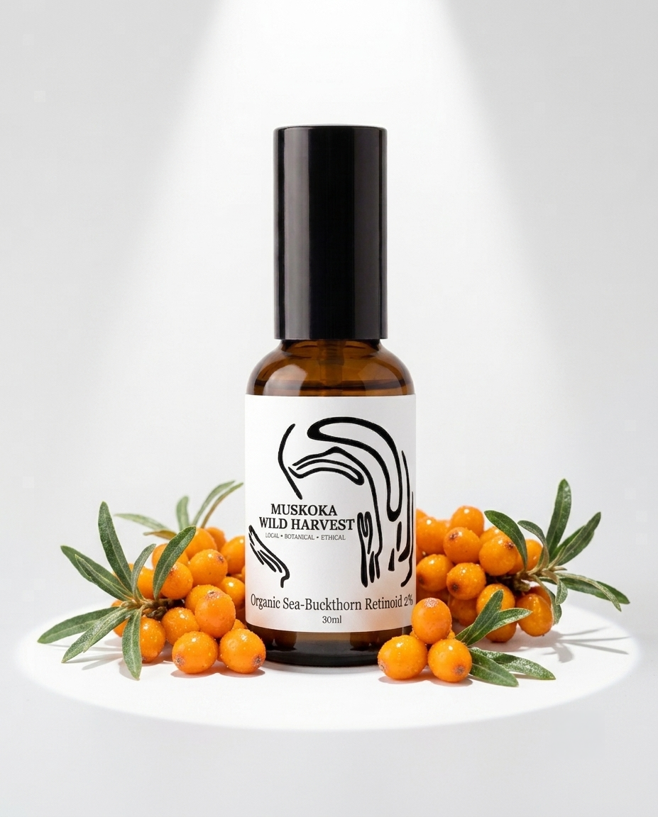 Bottle of Muskoka Wild Harvest sea buckthorn oil with sea buckthorn berries on a white background